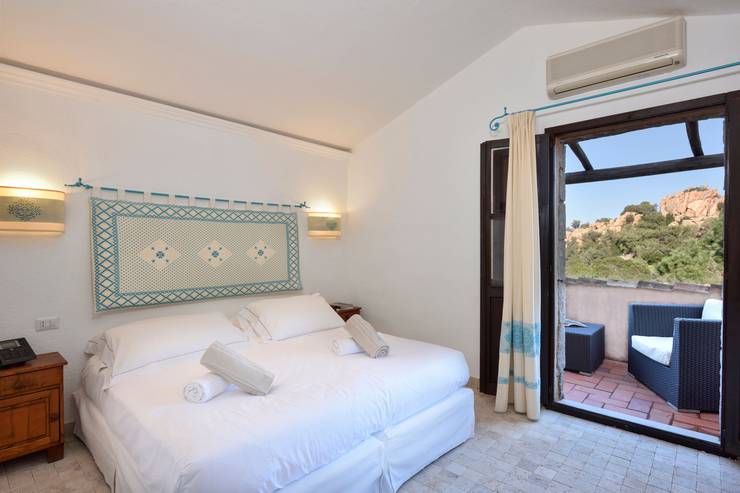 Deluxe double room with partial sea view sigillum cala moresca at arbatax park arbatax - sardinia Deluxe double room with partial sea view sigillum cala moresca at arbatax park arbatax - sardinia