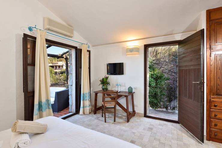 Deluxe double room with partial sea view sigillum cala moresca at arbatax park arbatax - sardinia Deluxe double room with partial sea view sigillum cala moresca at arbatax park arbatax - sardinia