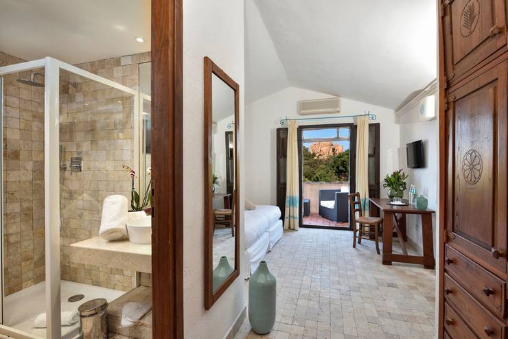 Deluxe double room with partial sea view sigillum cala moresca at arbatax park arbatax - sardinia Deluxe double room with partial sea view sigillum cala moresca at arbatax park arbatax - sardinia