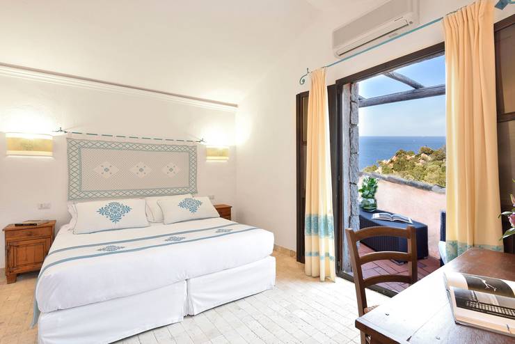 Deluxe double room with sea view sigillum cala moresca at arbatax park arbatax - sardinia Deluxe double room with sea view sigillum cala moresca at arbatax park arbatax - sardinia