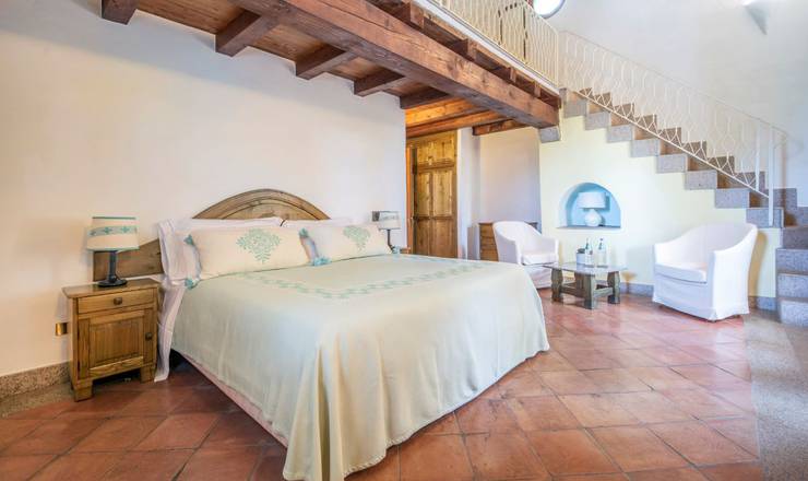Junior suite avec vue latérale sur la mer sigillum monte turri at arbatax park arbatax - sardaigne Junior suite avec vue latérale sur la mer sigillum monte turri at arbatax park arbatax - sardaigne